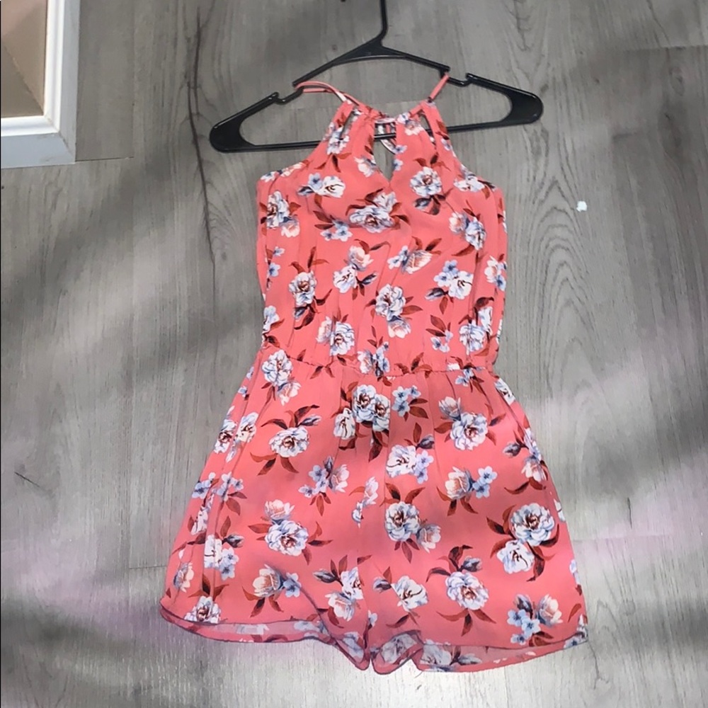 flower romper. no rips, tears, or stains